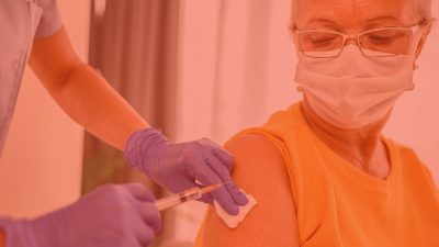 Senior female is about to receive Covid-19 coronavirus vaccine